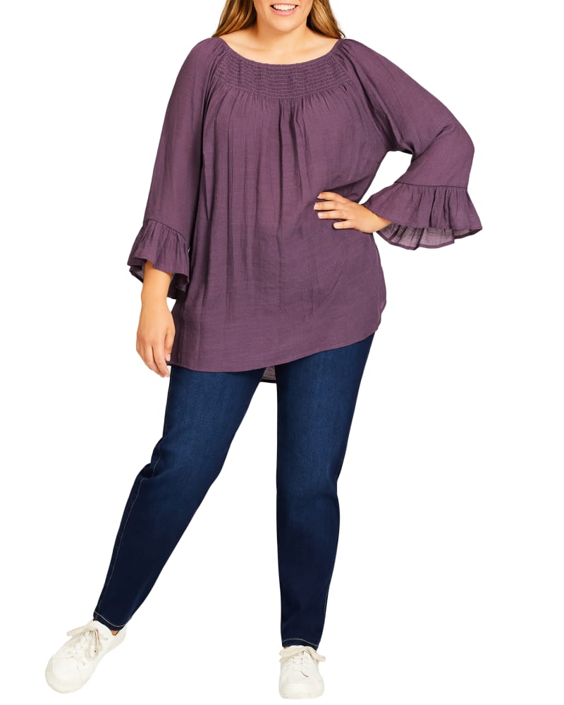 Front of a model wearing a size 14 Eliana Butter Skinny Jean in Medium Wash by avenue. | dia_product_style_image_id:242127